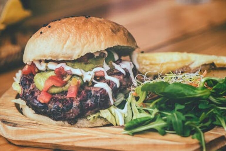 Olive burger: Here’s How to make it  at home What is an olive burger?? Well, it's unique, where the beef patty is topped with chopped or sliced olives and olive juice